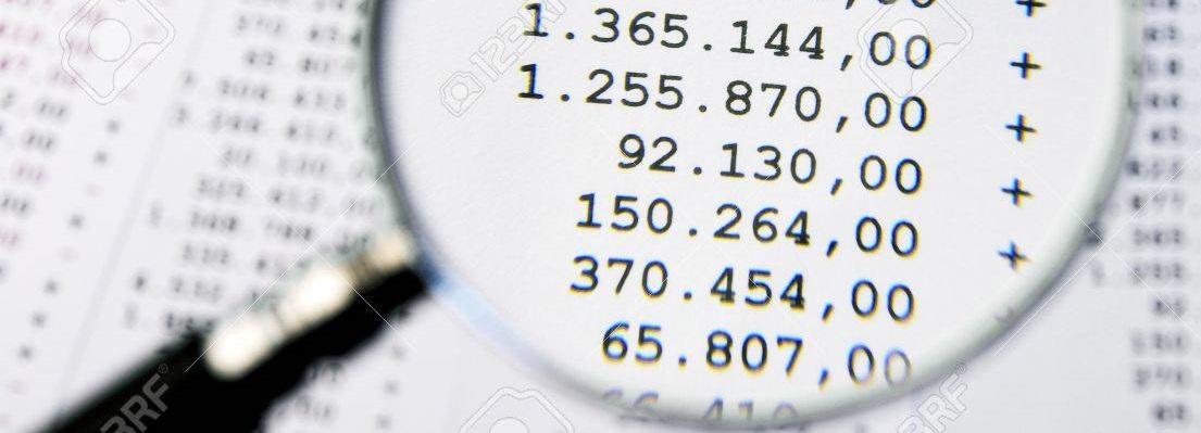 28012676-magnifying-glass-focused-on-a-large-amounts-billing.jpg
